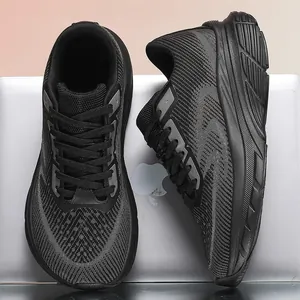 Detailed view of black breathable mesh running shoes with a wide-toe design for men.
