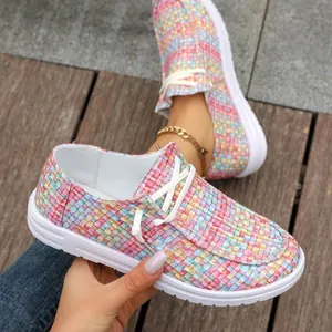 Vibrant multi-colored woven checkered slip-on loafers for women with white laces and soles