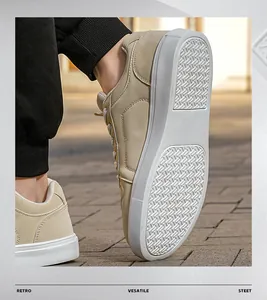 Detailed close-up of casual beige leather sneakers with thick white platform sole