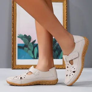 Comfortable women's hollow-out flat sandals with floral patterns and velcro strap