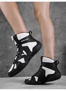 Close-up detail of professional high-top black and white boxing shoes for training