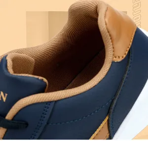 Close-up detail of men's leather sneaker featuring comfortable brown mesh lining