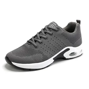 Breathable grey fly knit sports sneakers for men with cushioned height increasing sole