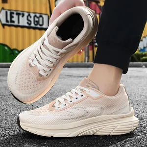 Side detail of men's breathable beige flyknit running shoes with extra wide fit design