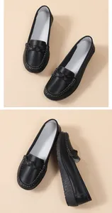 Comfortable black leather nurse loafers with flexible flat soles for all-day wear.