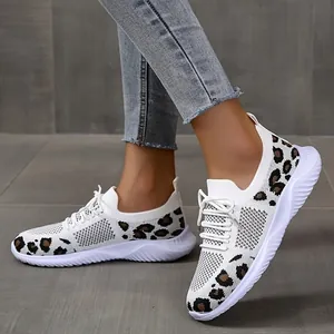 Stylish leopard print fly-knit sneakers for women with breathable mesh and white soles