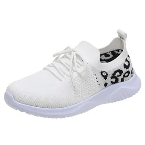 Breathable women's white mesh sneakers featuring stylish leopard print and lace-up closure