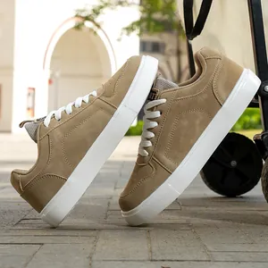 Versatile unisex khaki casual sneakers with thick white soles and sport tongue label