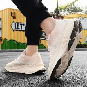 Close-up detail of breathable fly-knit running shoes featuring a slip-resistant thick sole.