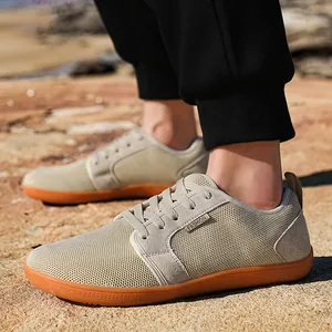 Scarpe a piedi nudi in Flyknit traspirante con punta larga e design a goccia zero