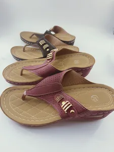 Wedge thong sandals for women featuring perforated straps and stylish gold hardware