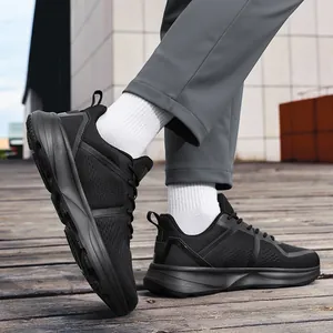 Wide width men's black athletic running shoes with breathable mesh and cushioned sole design