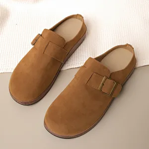 Classic brown suede closed-toe mules with adjustable metal buckle strap for women