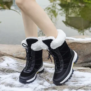 Women's waterproof snow boots with white fleece lining for winter outdoor use