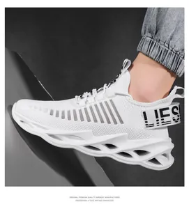 Side view of ultra-light white breathable flyknit running shoe with hollow blade sole