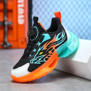 Breathable kids' sports shoes with rotary buckle and colorful flame pattern design.