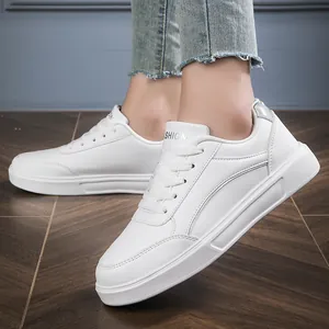 Classic white faux leather low-top platform sneakers for women in a casual street style