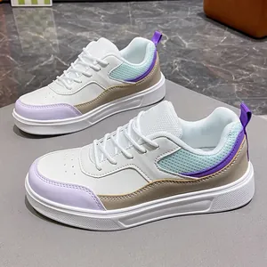Stylish women's low-top color-block leather sneakers perfect for casual skateboarding