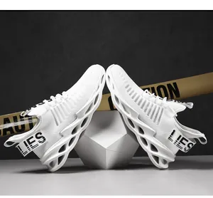 Detail showing the breathable flyknit mesh and hollow blade sole of white running shoes.