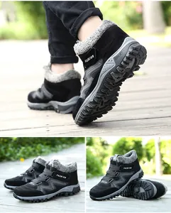 Vue détaillée de bottes de neige d'hiver noires avec doublure en fausse fourrure et semelle.