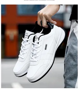 Detailed view of white men's outdoor sneakers featuring a wear-resistant rubber outsole