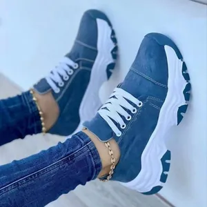 Stylish casual women's platform sneakers featuring blue denim fabric and chunky white soles