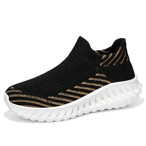 Black and gold breathable knit slip-on sneakers with chunky white sole for men and women