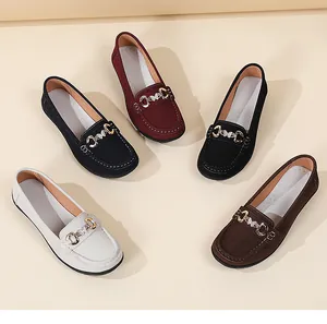 Variety of casual flat loafers for women in multiple colors with metal buckles