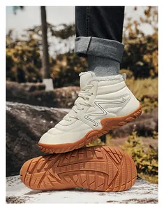 Side and sole view of beige fur-lined high-top waterproof outdoor winter snow boots