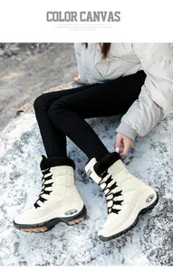Botas de nieve para mujer blanco crema con ribete de piel sintética negra