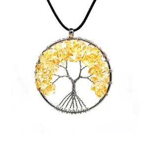 Close-up of wire-wrapped Tree of Life pendant with yellow crushed natural stones