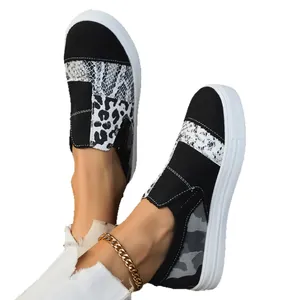 Stylish mixed-pattern flat canvas loafers with platform sole and snake print