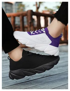 Detailed view of lightweight flyknit sneakers in purple white and black color variants