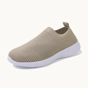 Comfortable khaki women's fly-knit slip-on socks shoes featuring a soft white cushioned sole
