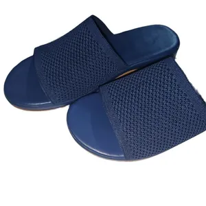 Comfortable navy blue fly-knit slide sandals for women with minimalist flat soles