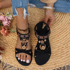 Bohemian ethnic style black flat sandals with vintage floral and wood bead accents