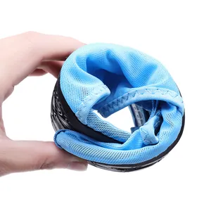 Close-up of flexible light blue mesh water shoe being folded to show soft texture