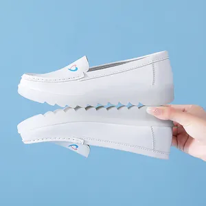 Professional white nurse work shoes with thick non-slip soles and heart detail embroidery