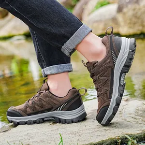 Men's brown non-slip hiking shoes for outdoor camping, trekking, and rugged mountain adventures.