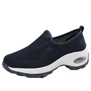Breathable blue knit rocker shoes for women with comfortable thick wedge air cushion sole.