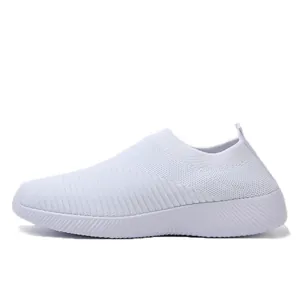 Side view detail of white ultralight fly-knit mesh slip-on shoes for women