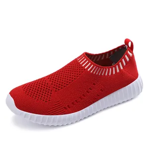 Women's breathable red mesh slip-on running sneakers featuring soft white knit texture