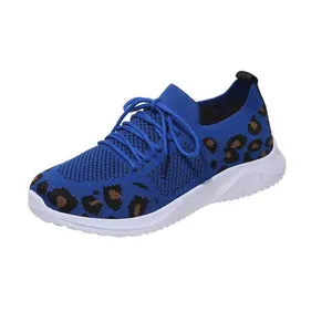Blue mesh women's sneaker featuring stylish leopard print accents and white sole