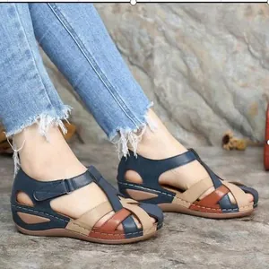 Retro women's wedge sandals with multicolor crisscross straps and stitching detail