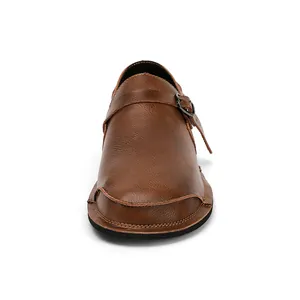 Close-up front view of vintage brown leather casual shoe with monk strap and wide toe