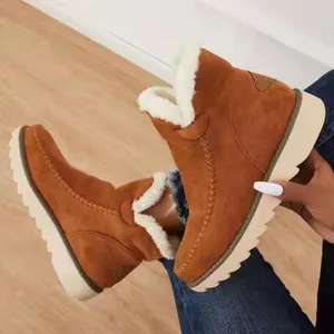 Bottines d'hiver confortables en daim marron avec semelle plateforme et fausse fourrure