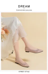 Detailed view of women's pink pointed toe knitted flat shoes with hollow design