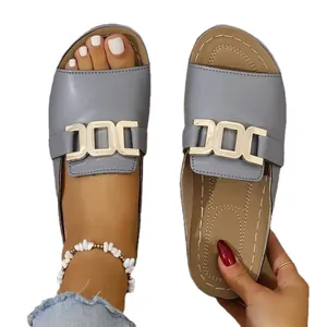 Elegant grey peep-toe wedge slide sandals for women featuring stylish gold buckle