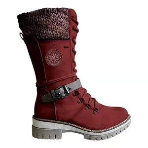 Detail view of burgundy winter knight boots with knitted collar and lace-up front.