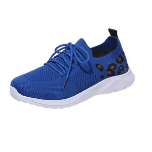 Detailed side view of the breathable blue mesh women sneaker featuring leopard print heel accents